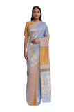Handwoven liquid molten textured metallic engineered stripe saree